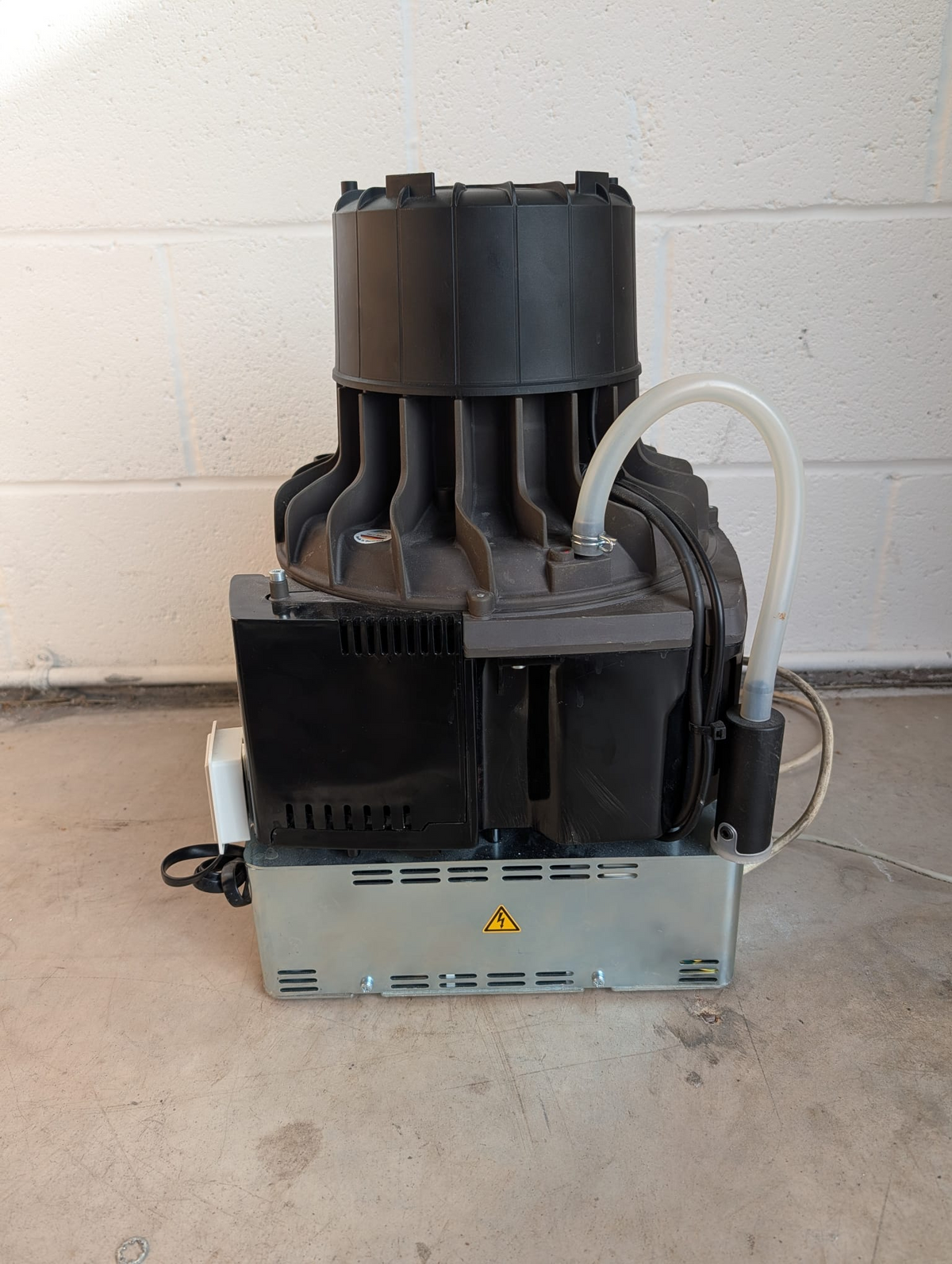 Side view of used Dürr Dental VSA 300 S suction unit and connections